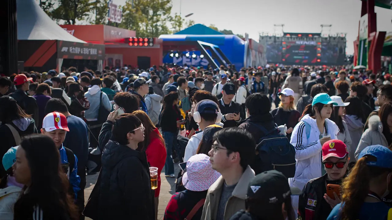 large crowd of fans in the paddock and Pitt Street area at the Chinese Grand Prix