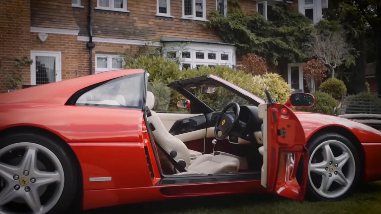Ferrari F40 interior with doors open and driver seat visible