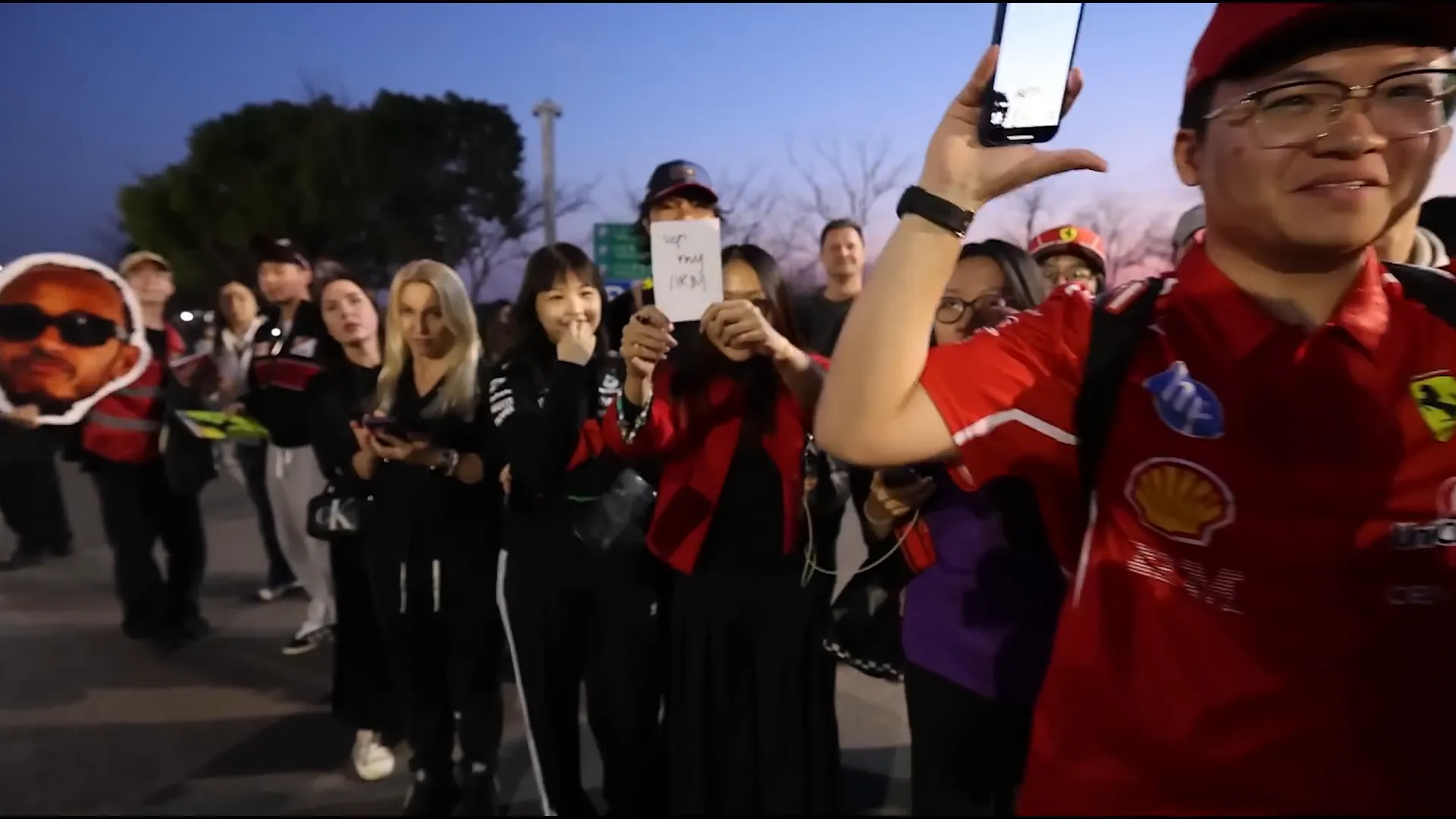 Fans waiting for driver arrivals