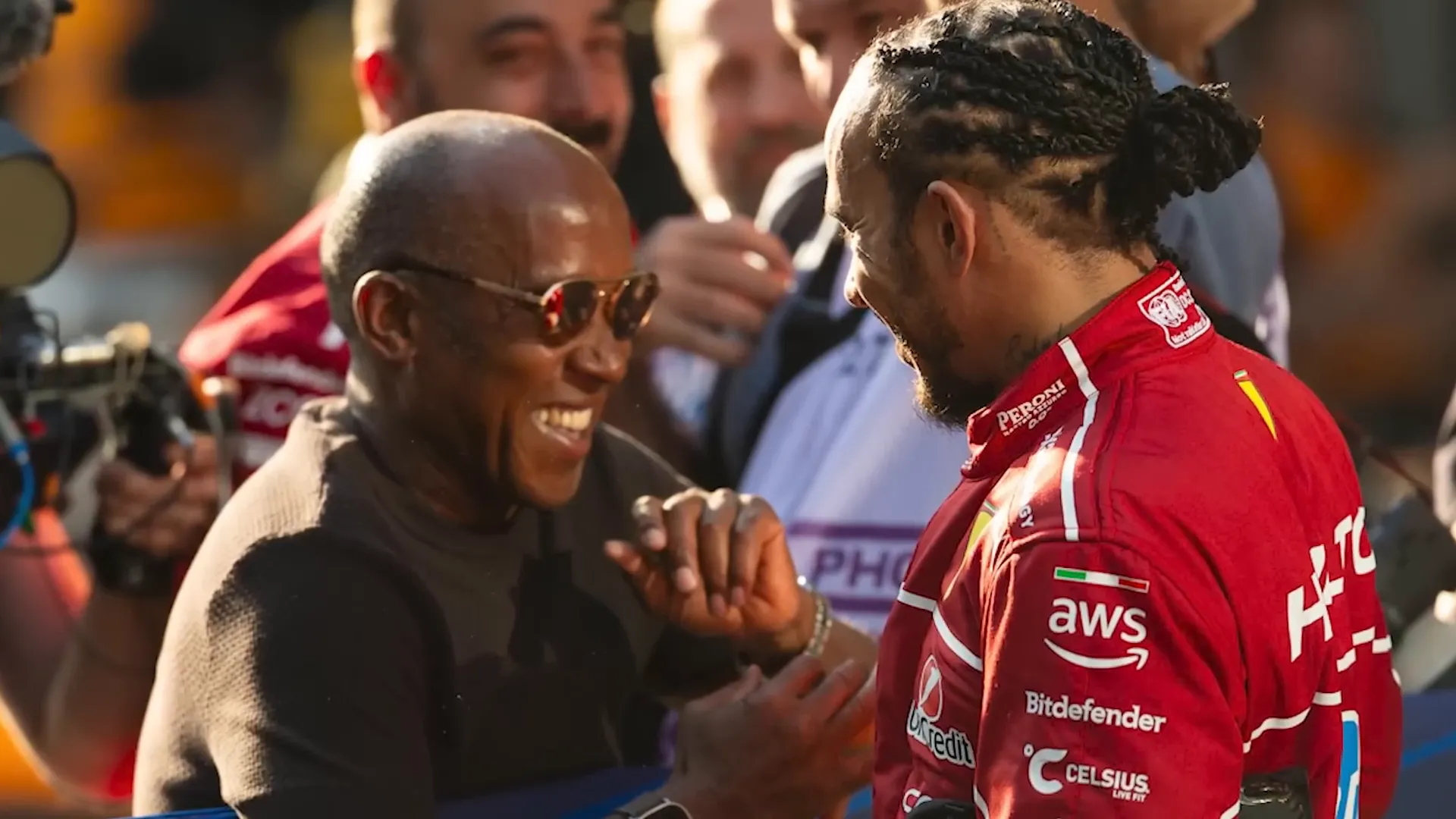 Lewis Hamilton hugging his father