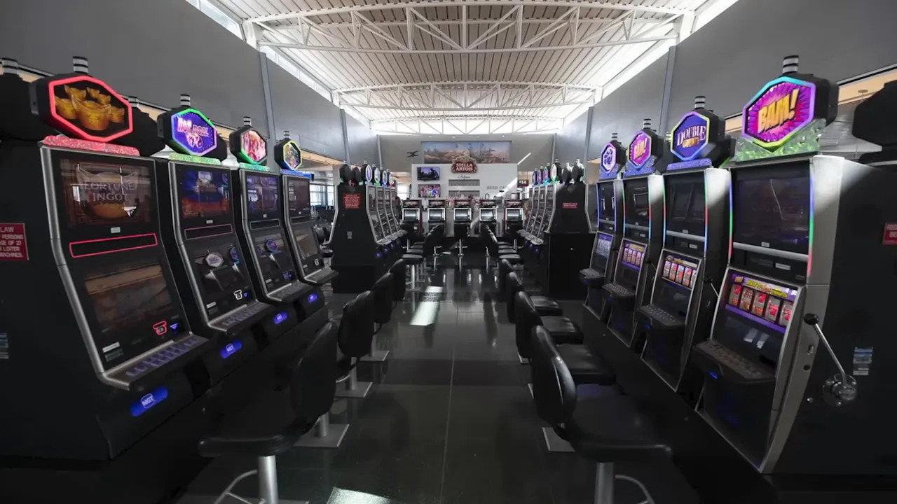 Interior view of a Perth casino with rows of electronic gaming machines