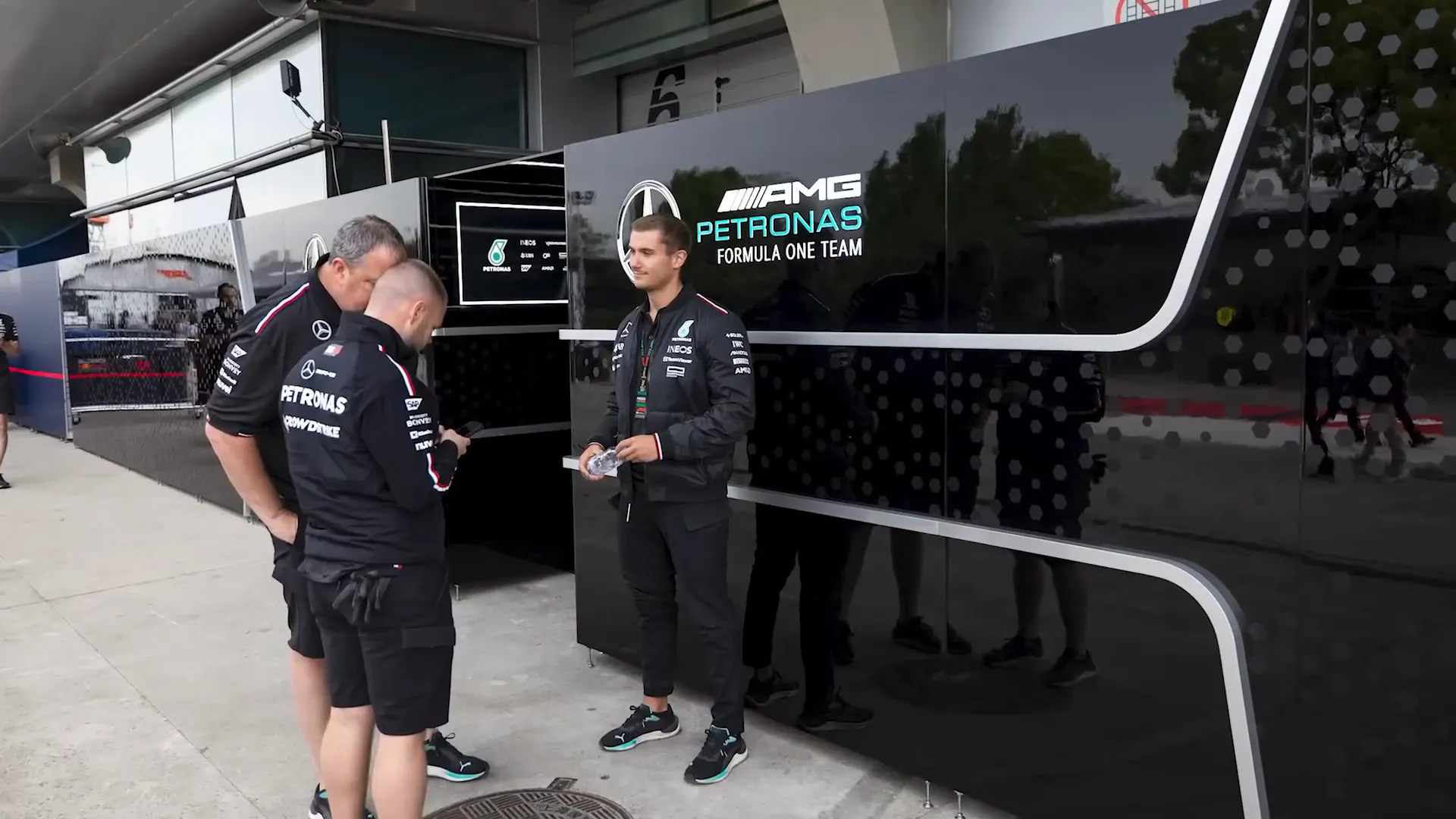 F1 crew waiting in hotel due to freight delays.