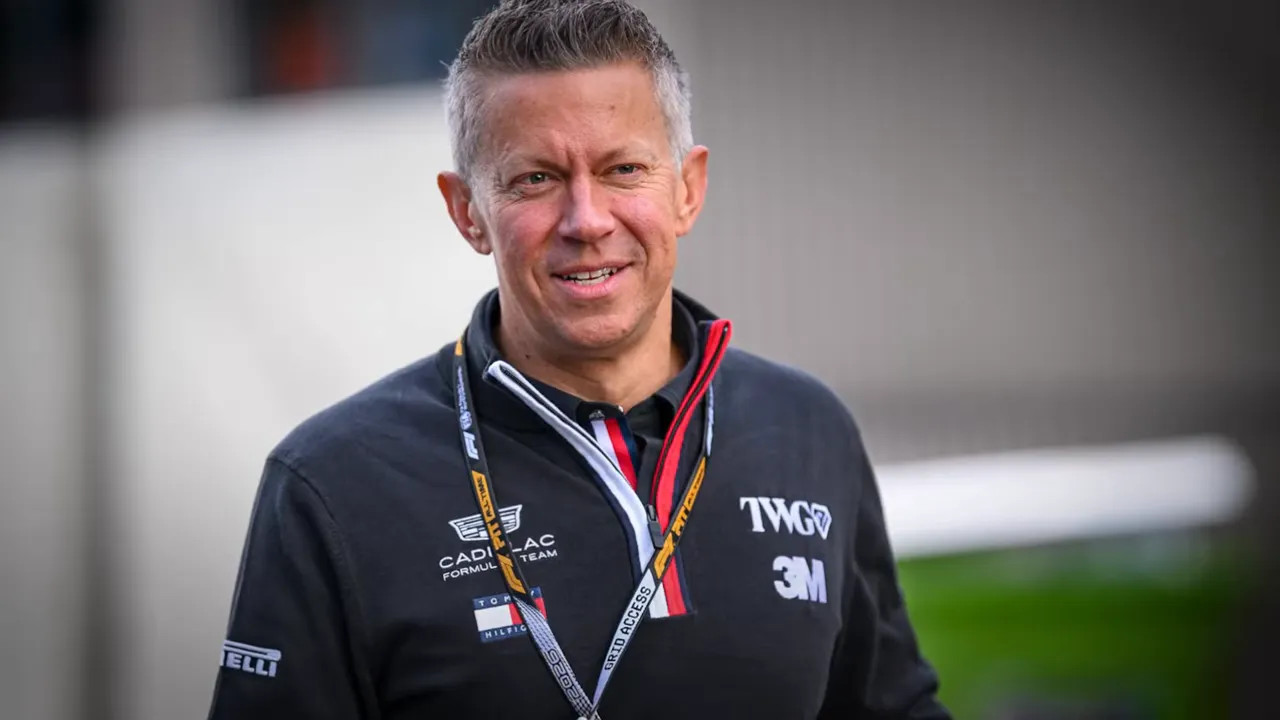 Marcin Budkowski in a black TWG shirt with his name displayed in white text