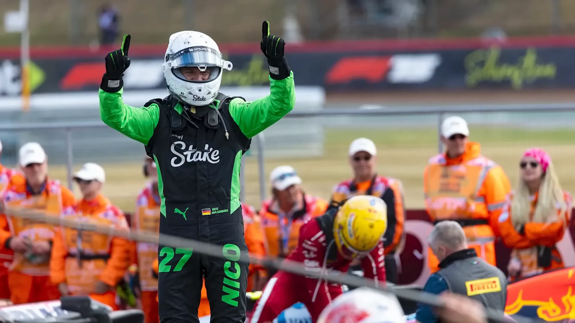 Nico Hulkenberg celebrating on the podium after his first F1 podium finish