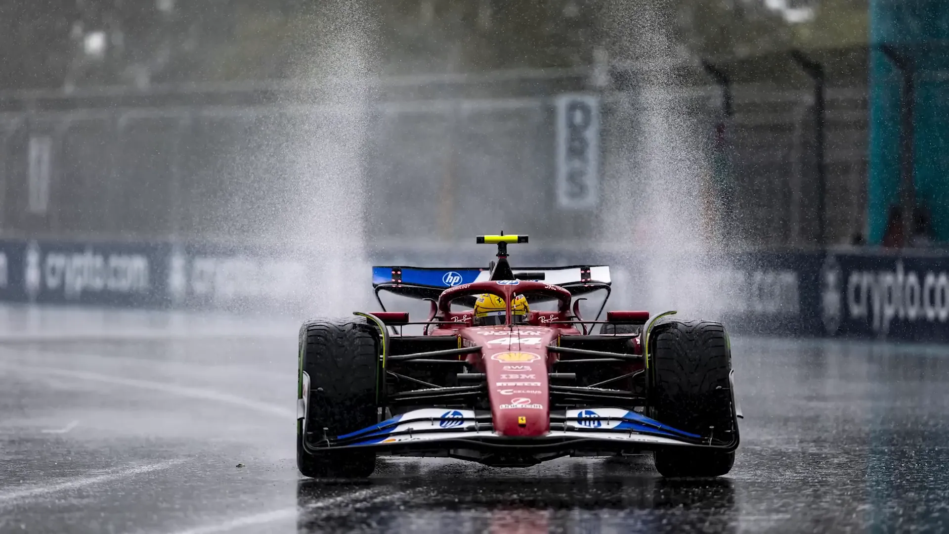 Cars racing in the rain at Miami GP