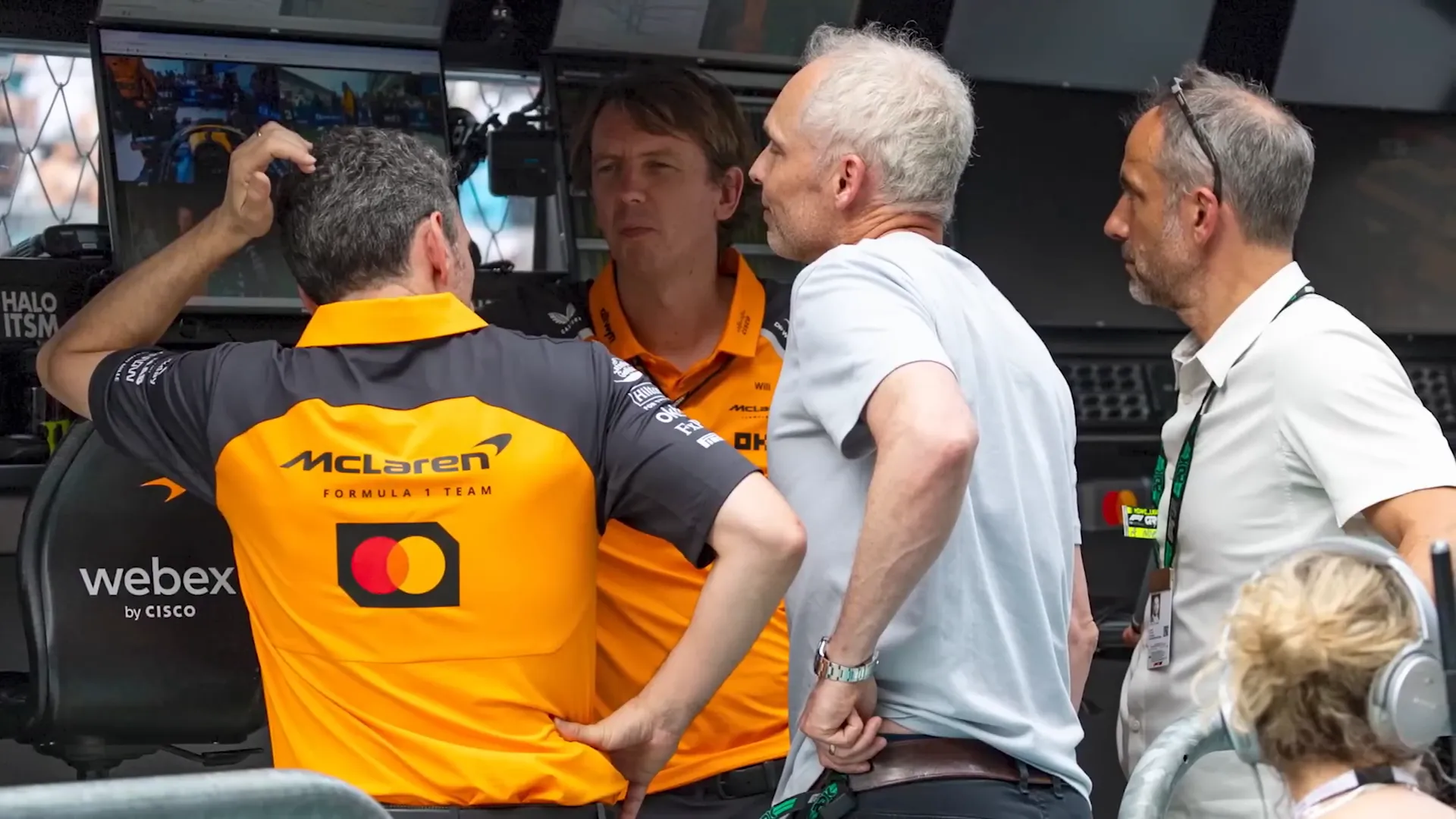 Oscar Piastri and team discussing strategy