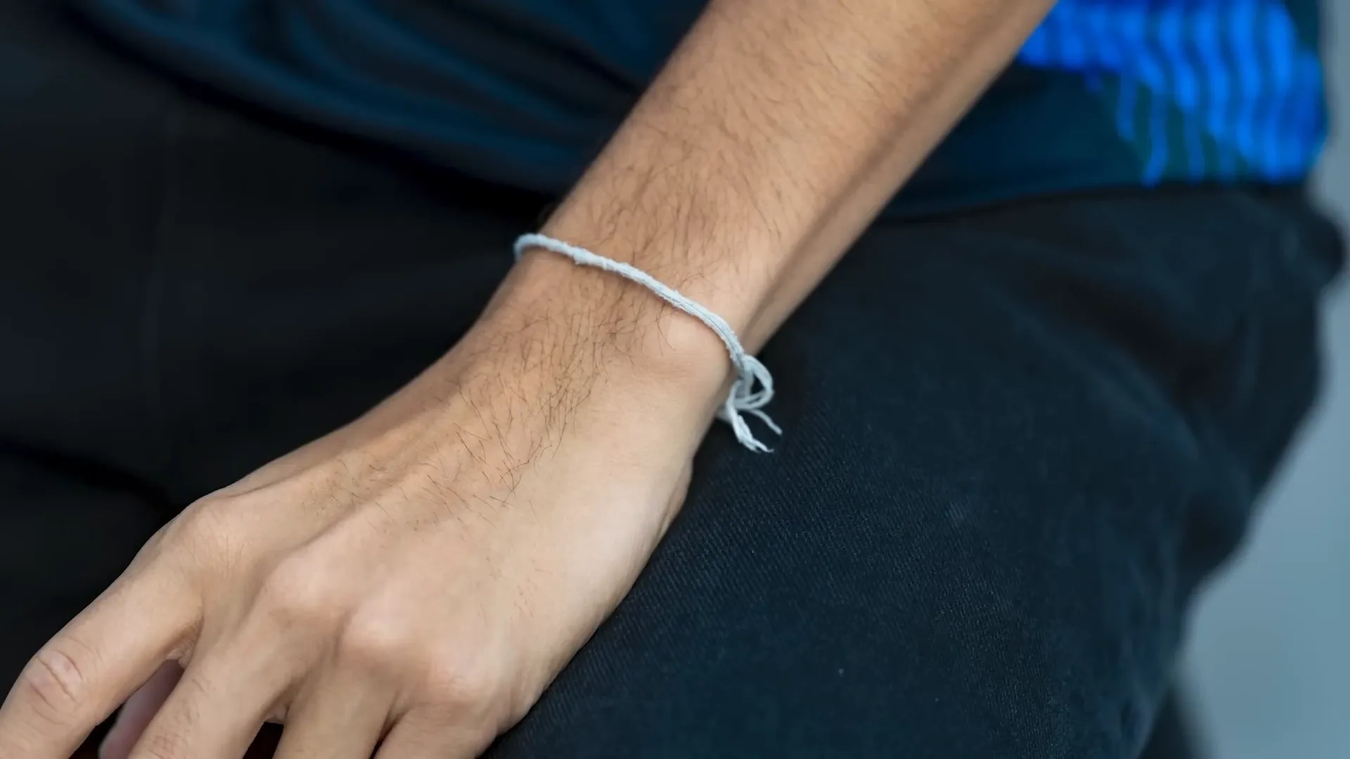 Alex Albon being interviewed with twine on his wrist