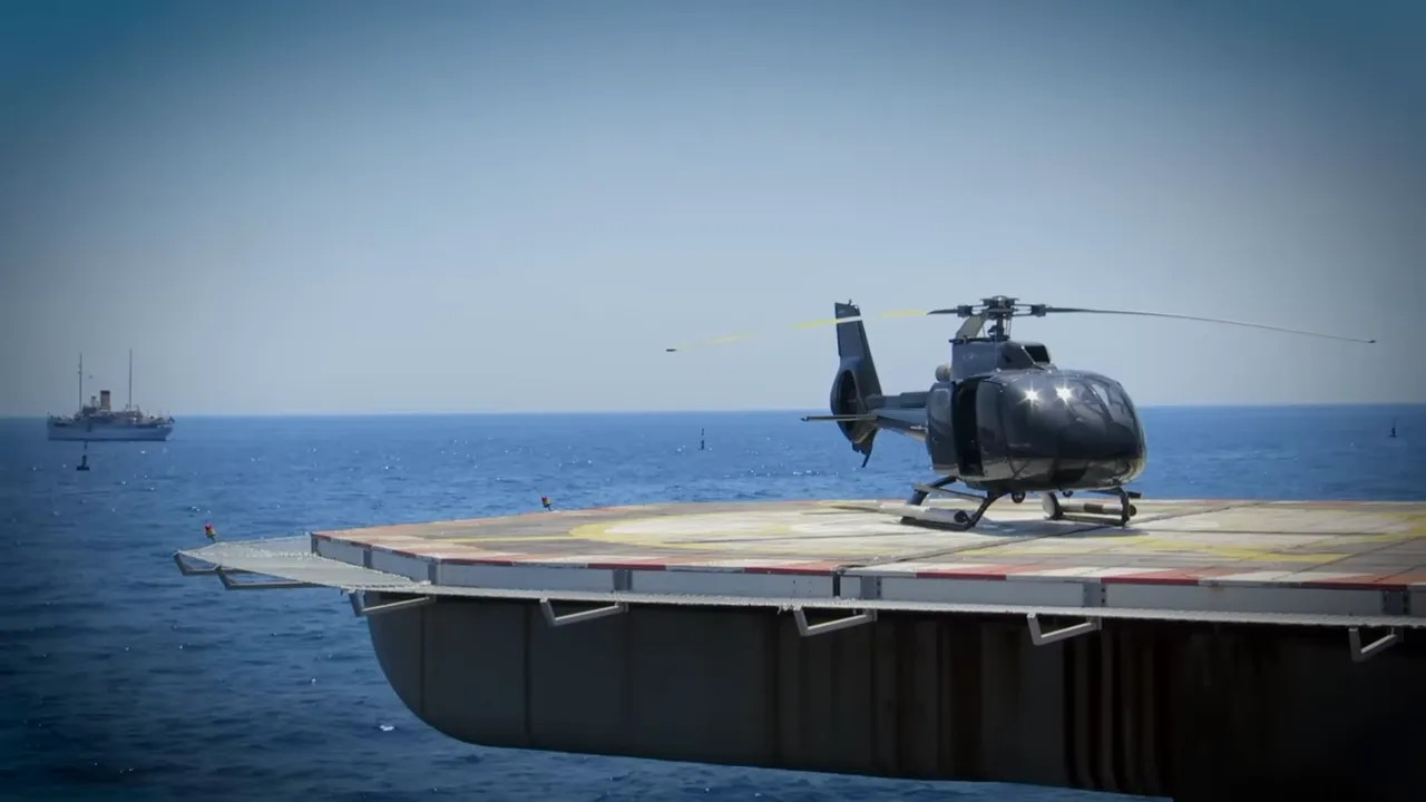 Helicopter on a floating platform at sea representing race week travel logistics