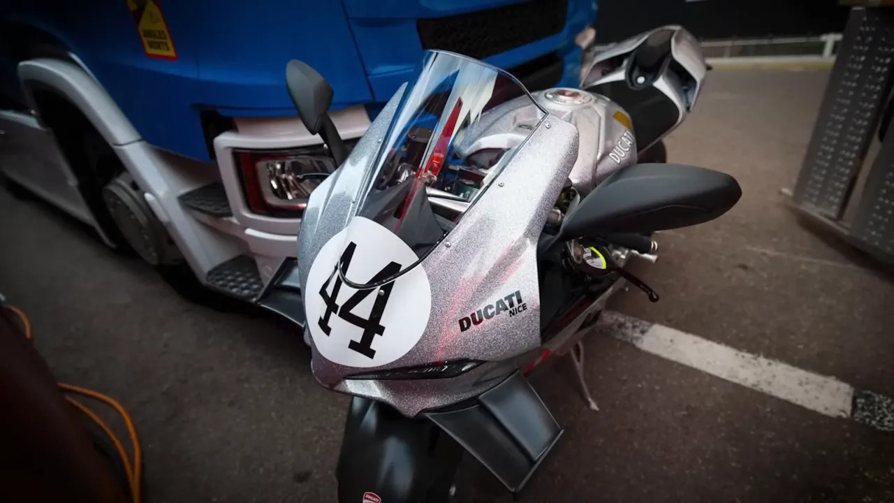 Front view of a silver Ducati motorcycle with the number 44 on the fairing