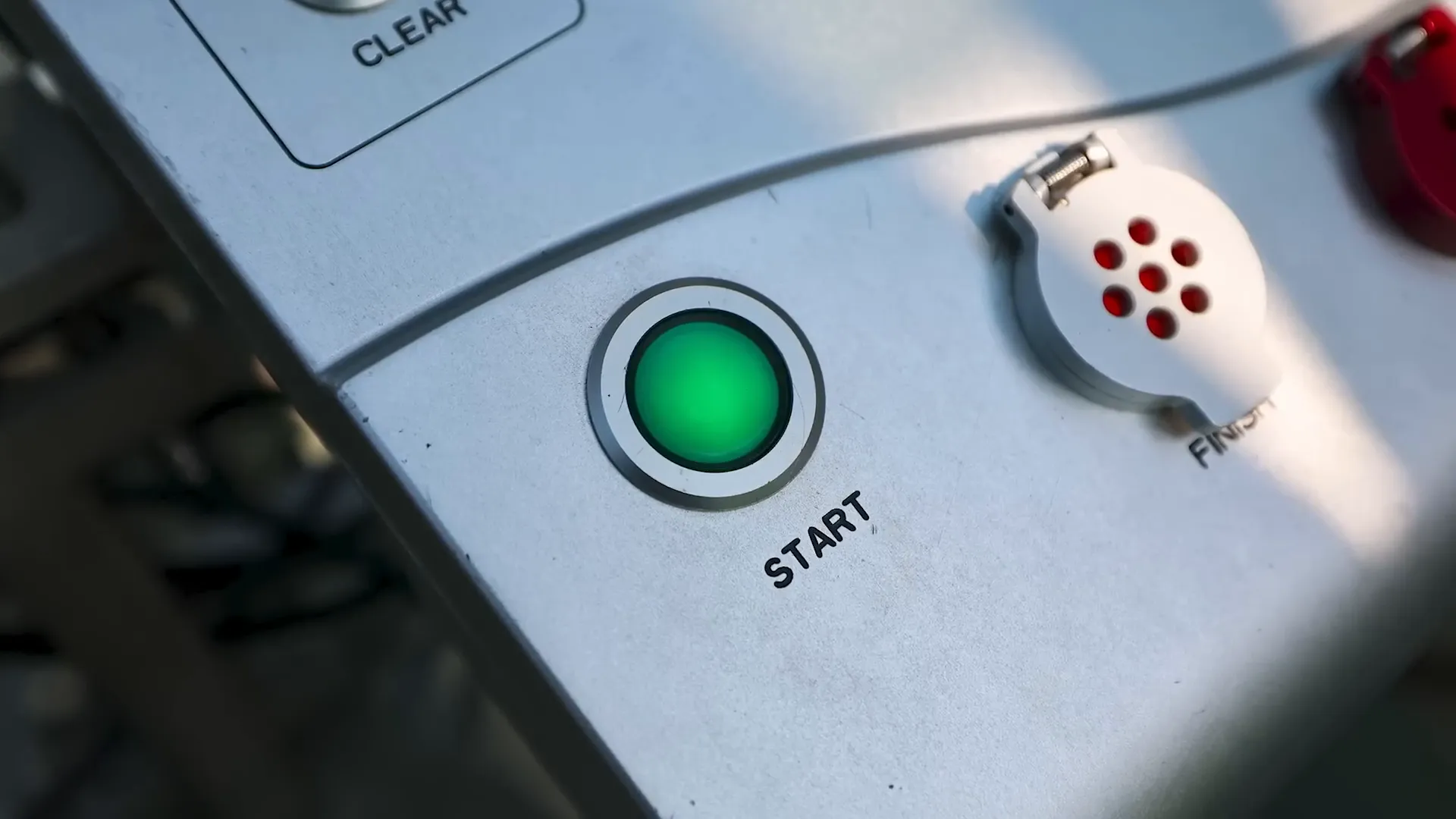 Start button being pressed