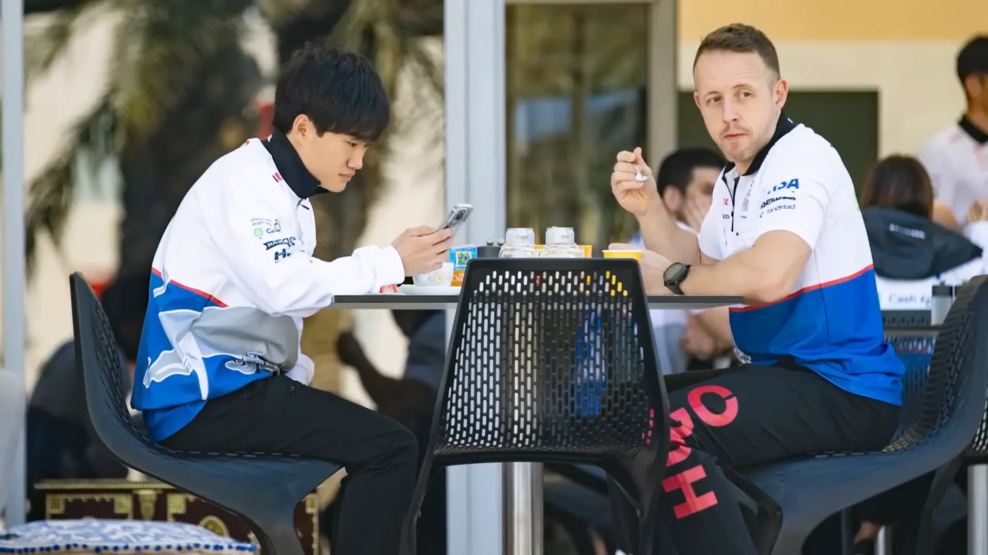 Yuki Tsunoda with his trainer