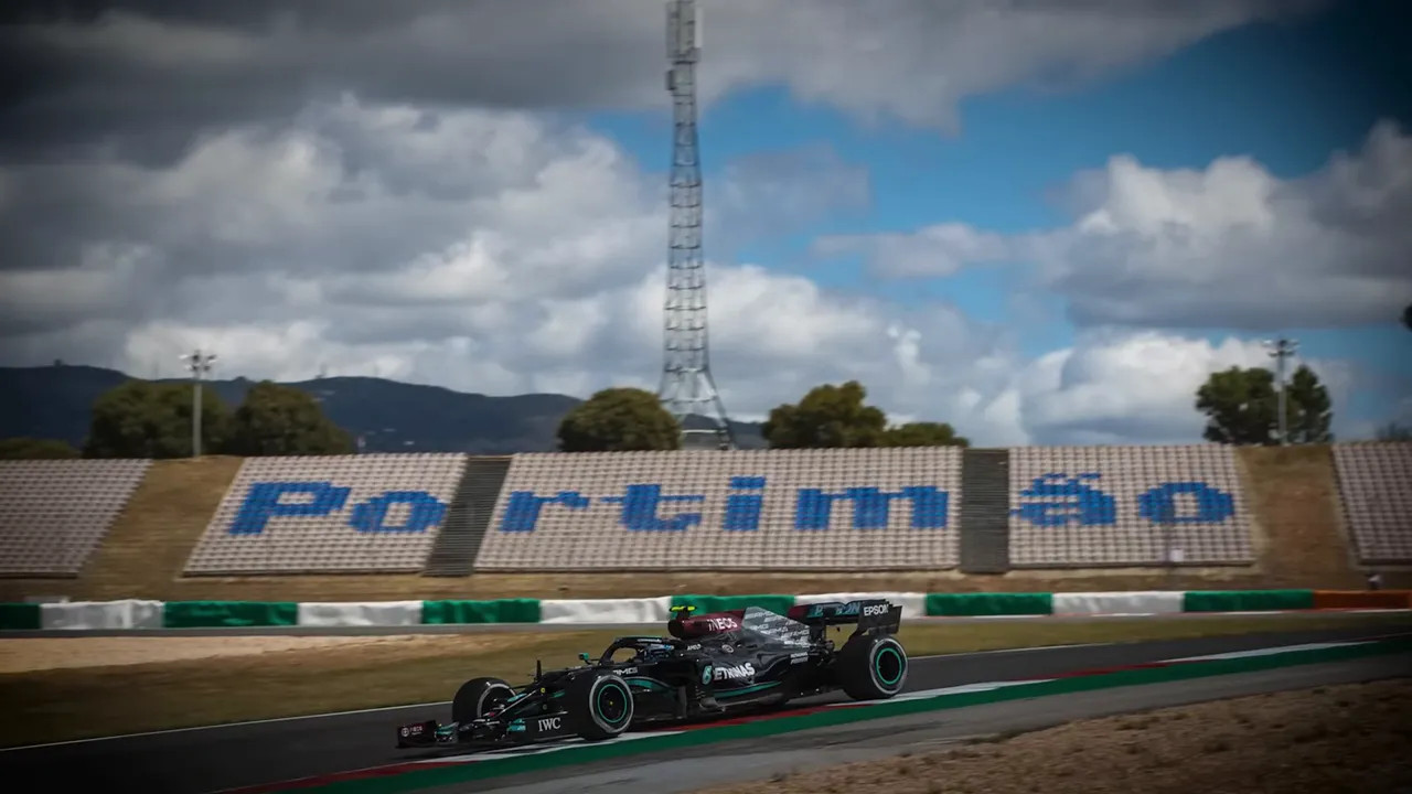 Formula 1 car passing Portimao circuit sign