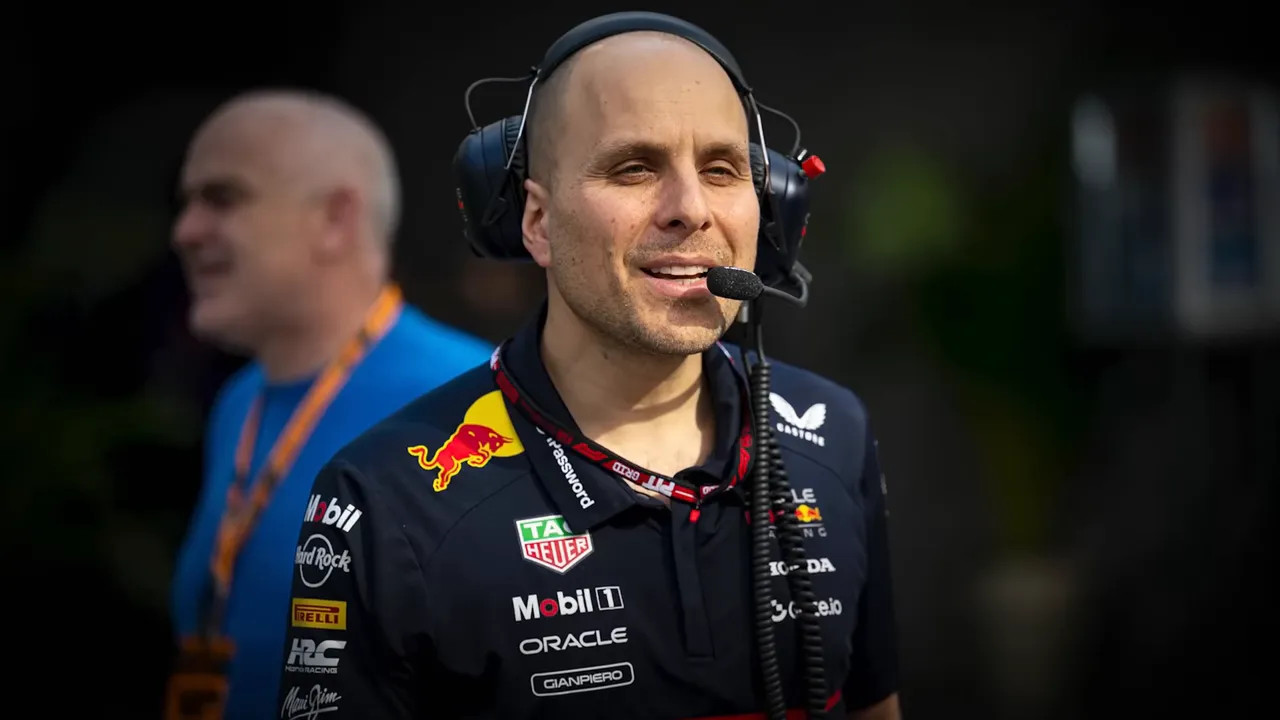 Gianpiero Lambiase wearing a Red Bull team headset and speaking on race radio