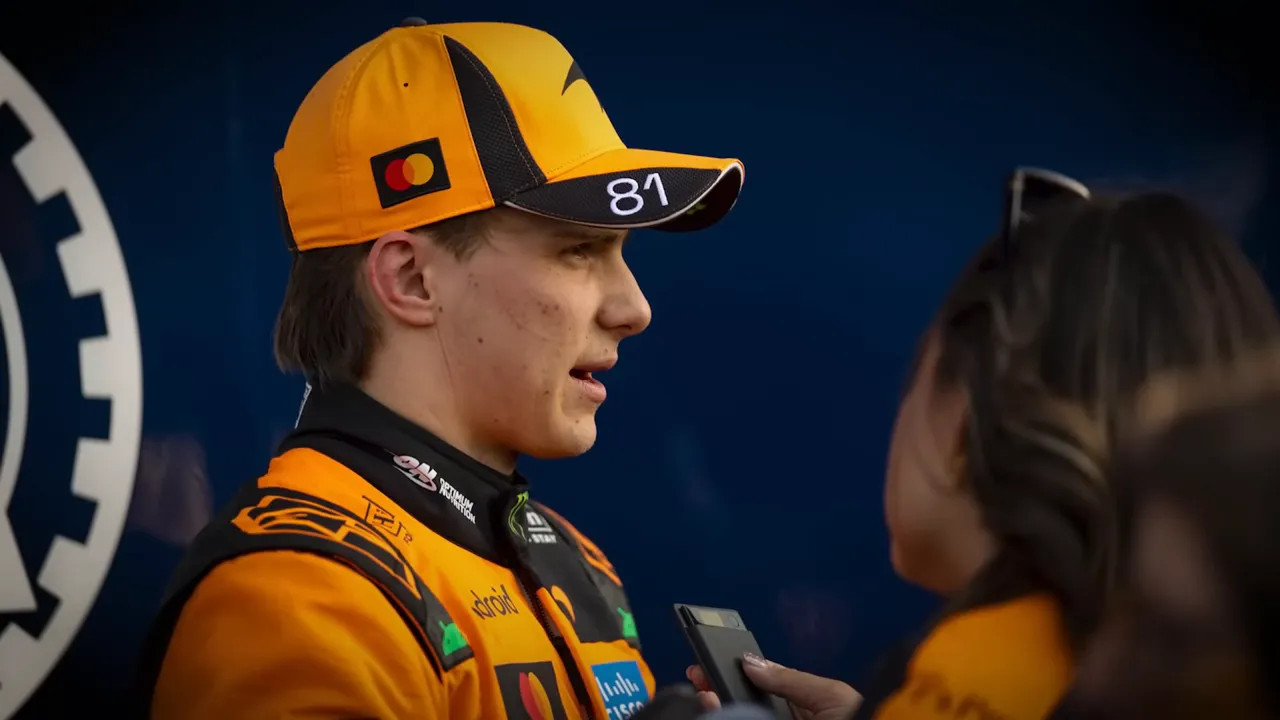 Driver in media setting being recorded or observed during F1 communications