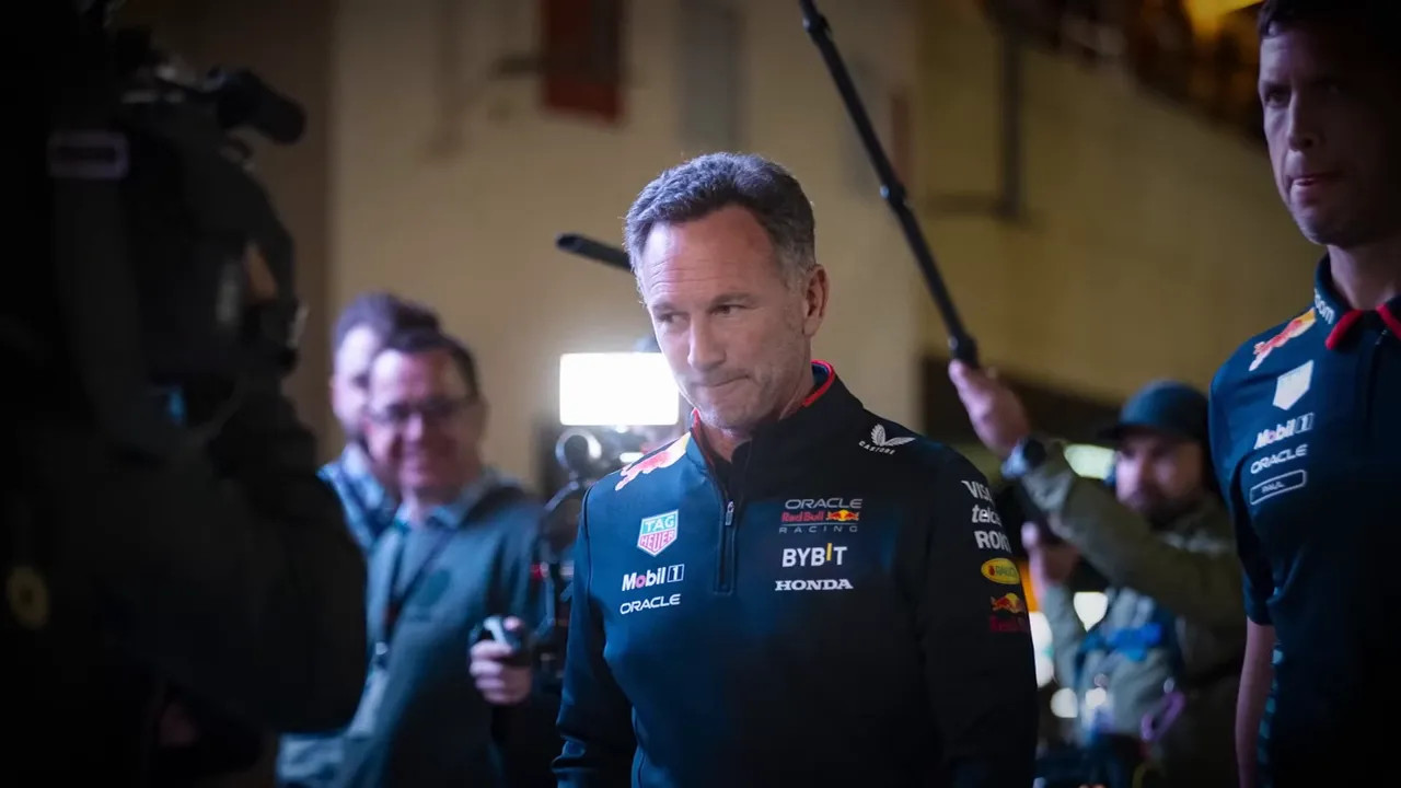 Red Bull team representative and press in the paddock during a media access moment