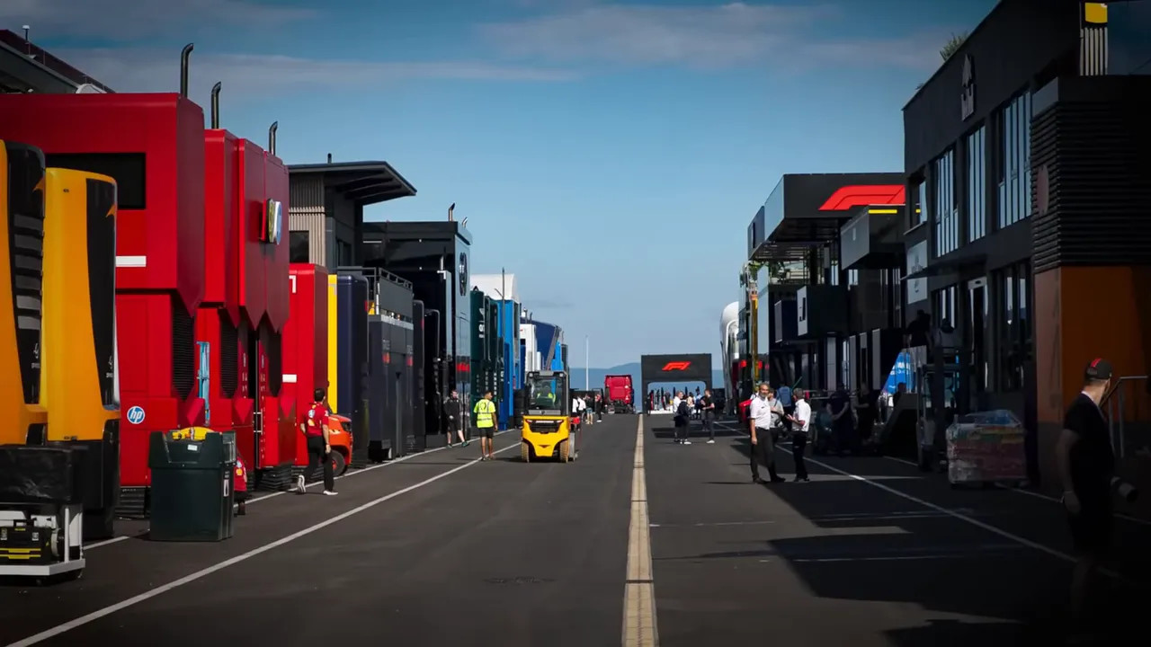 F1 motorhomes and paddock area showing multiple team motorhomes