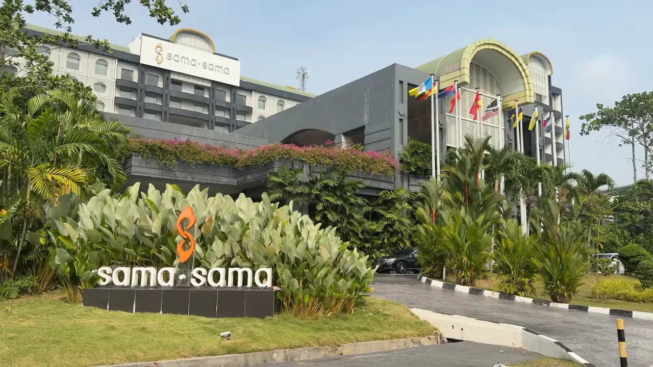 Sama-Sama hotel exterior surrounded by tropical landscaping