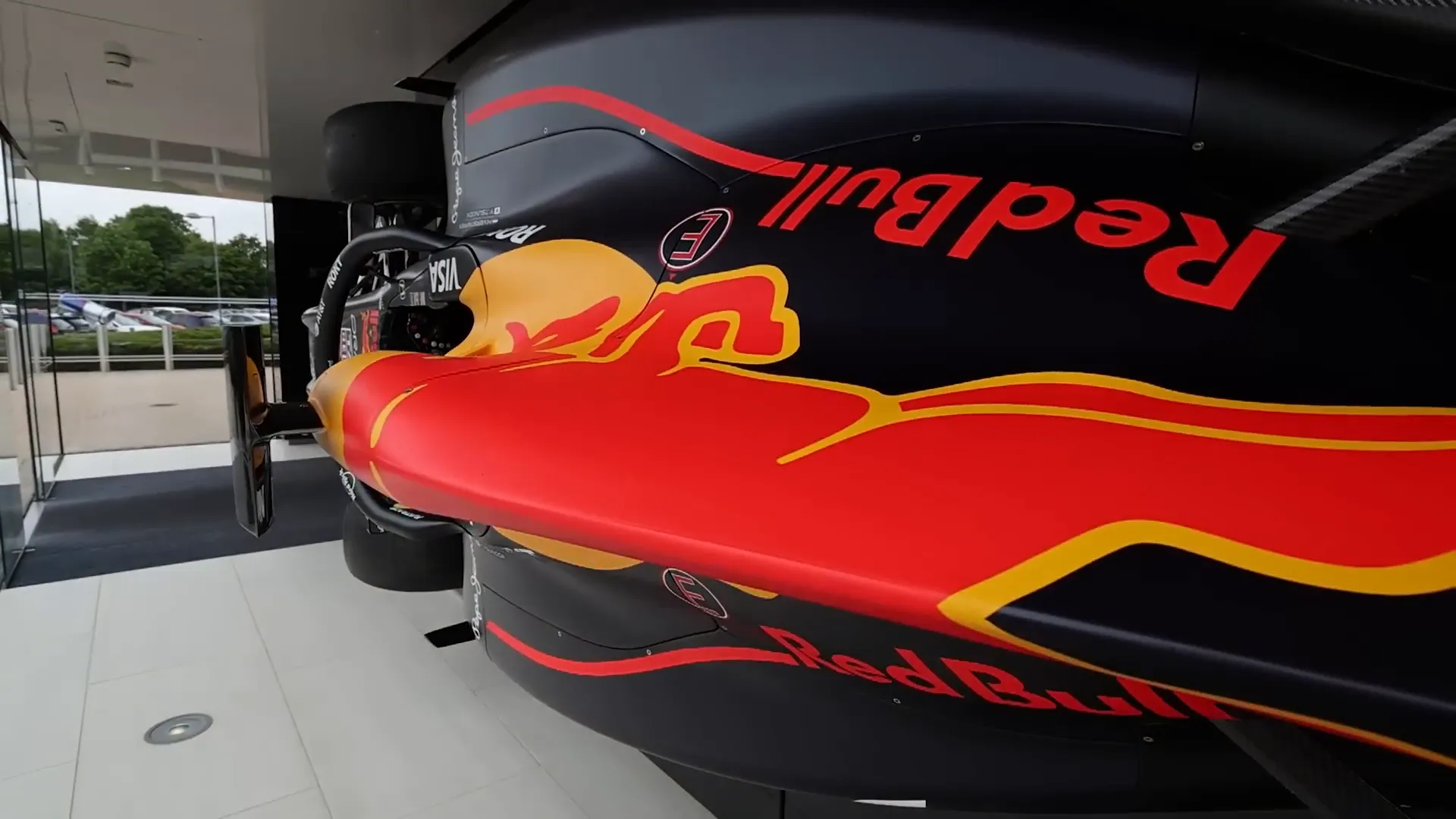 Formula 1 car mounted on the wall inside Red Bull Racing