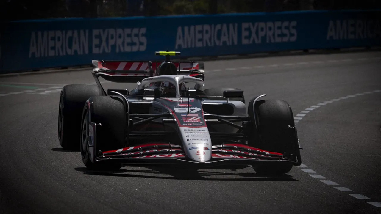 Marshal and car at a racetrack after a rules infringement