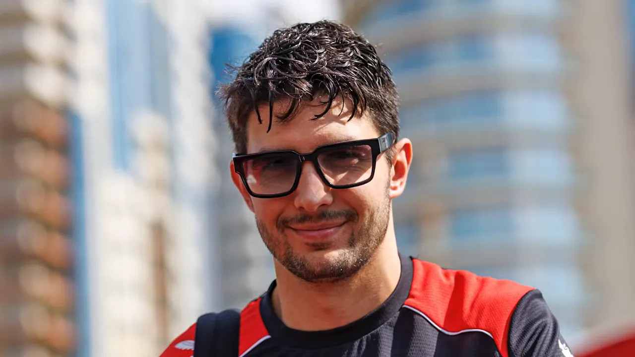 On-screen headline stating that Ocon is a free agent for next year amid ongoing Haas discussions