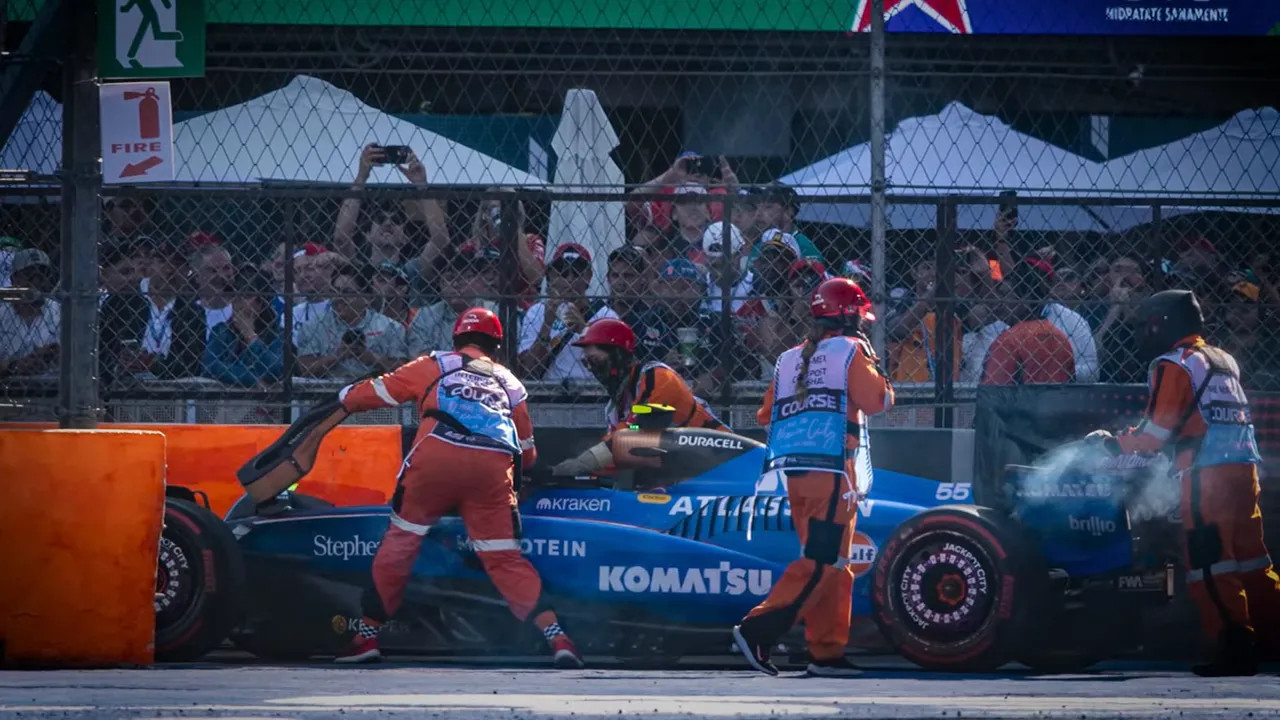 Carlos Sainz exiting his car after the spin in the stadium