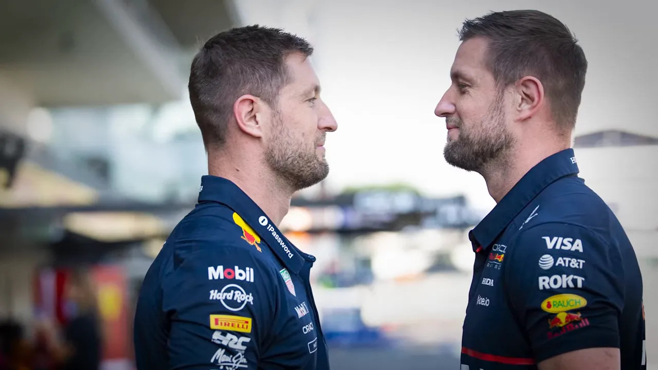 Matt and John Keller directing cars out of the Red Bull garage