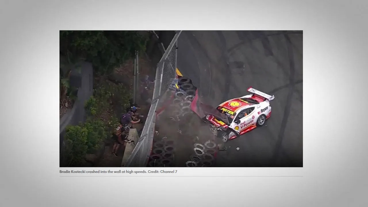 Overview of a Supercars crash showing debris and emergency response