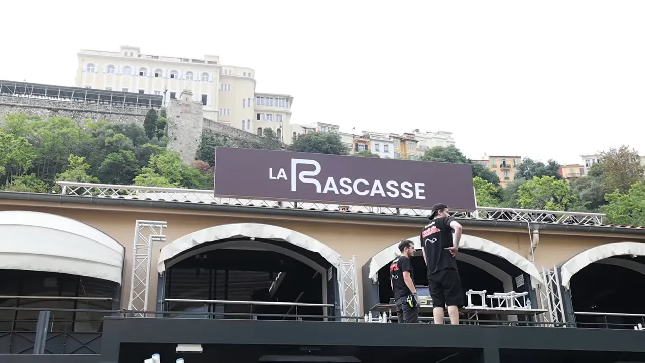 La Rascasse venue sign above arches beside the circuit