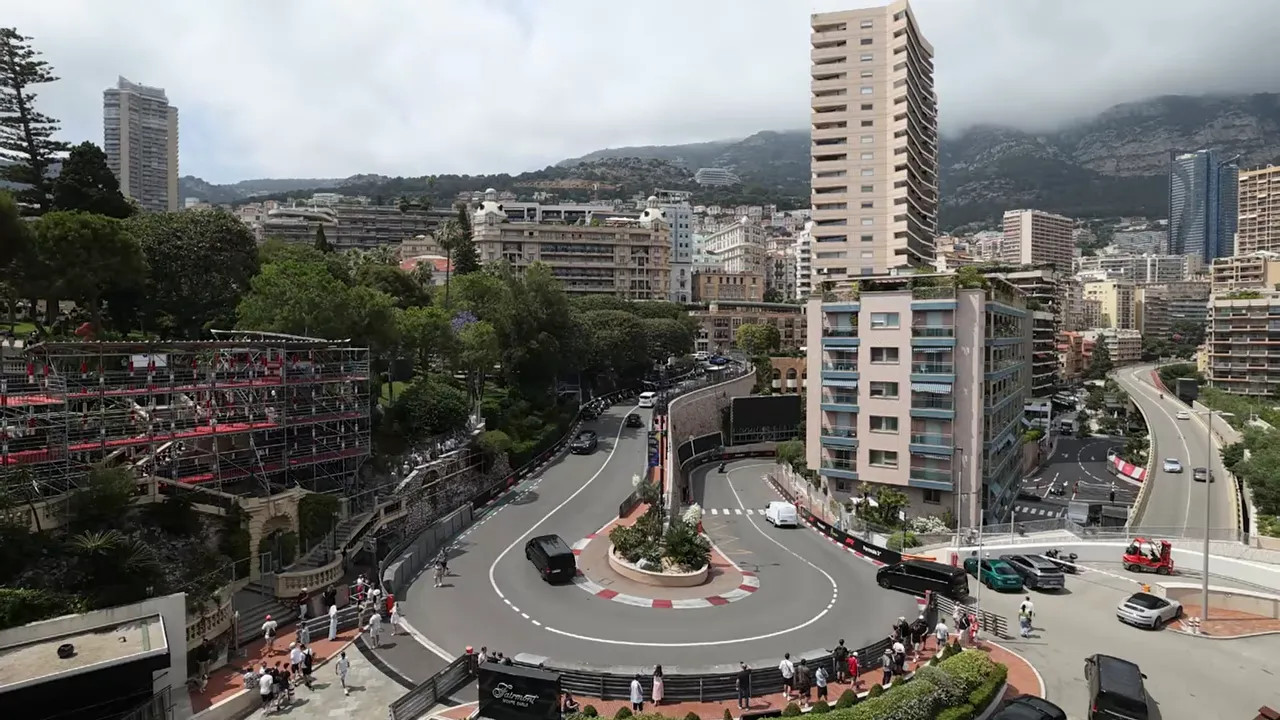 Wide overhead view of the Fairmont hairpin with surrounding buildings and roads