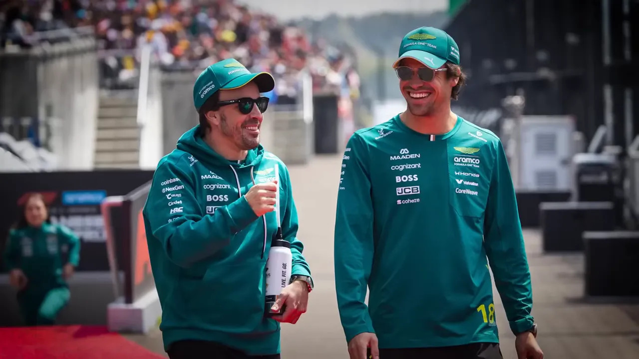 Lance Stroll walking on a race-weekend podium area after an event