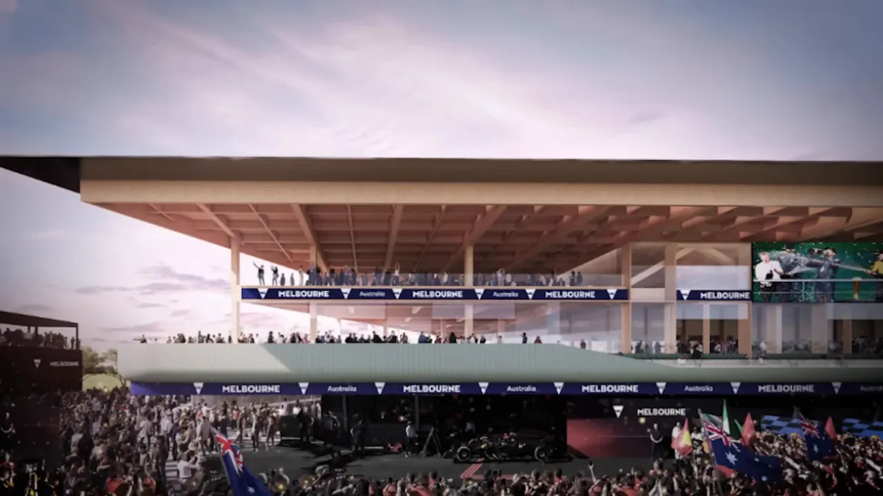 Architectural rendering of a new multi‑tiered pit building at the Melbourne circuit with crowds and paddock activity beneath.
