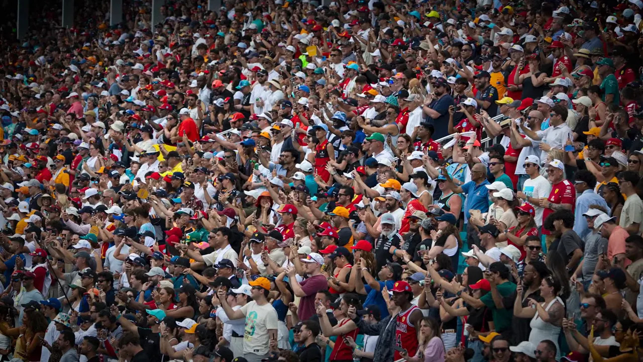 Miami Grand Prix grandstand crowd under stadium lighting