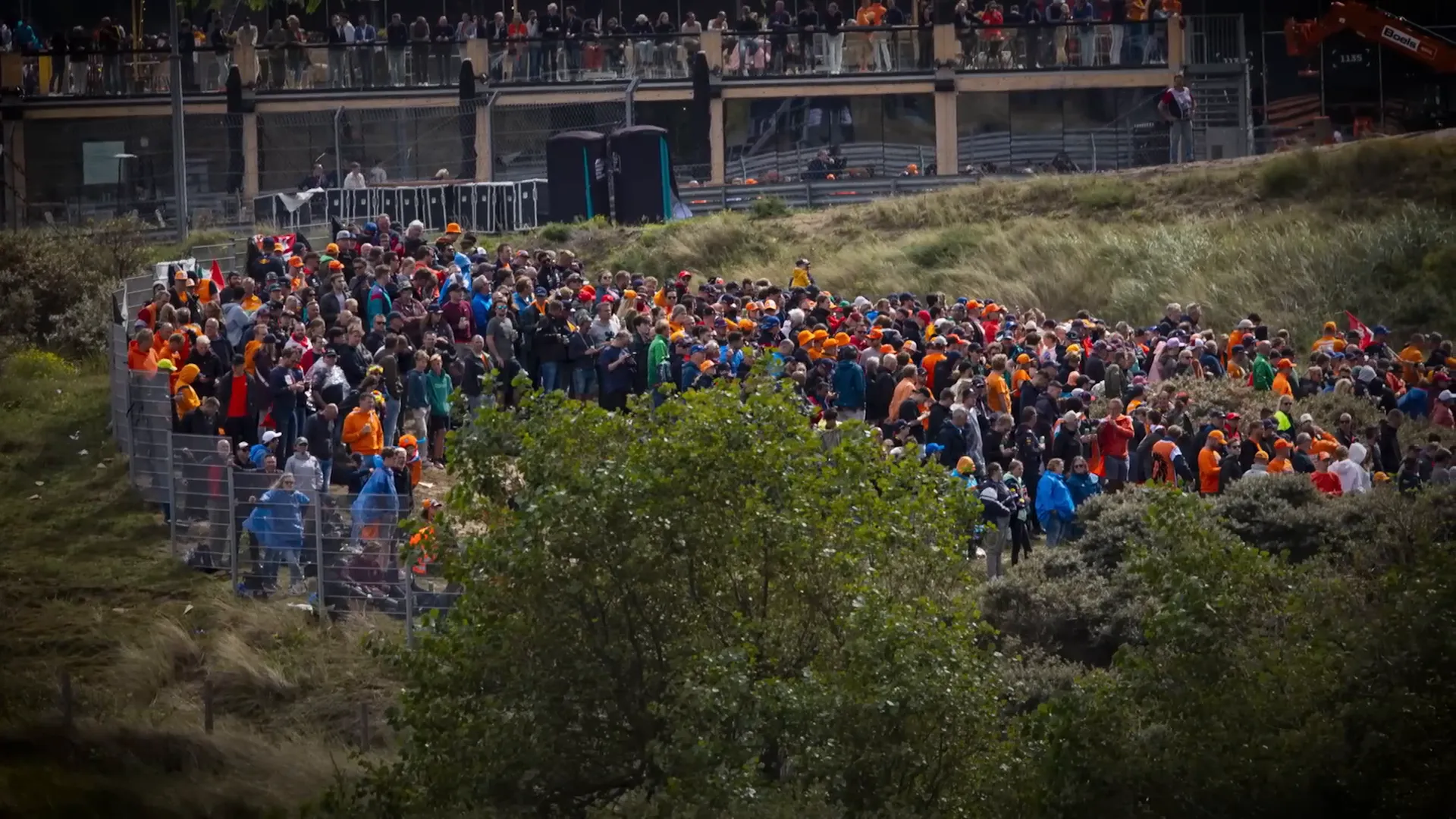 Grandstands with many empty seats at Zandvoort showing unsold tickets