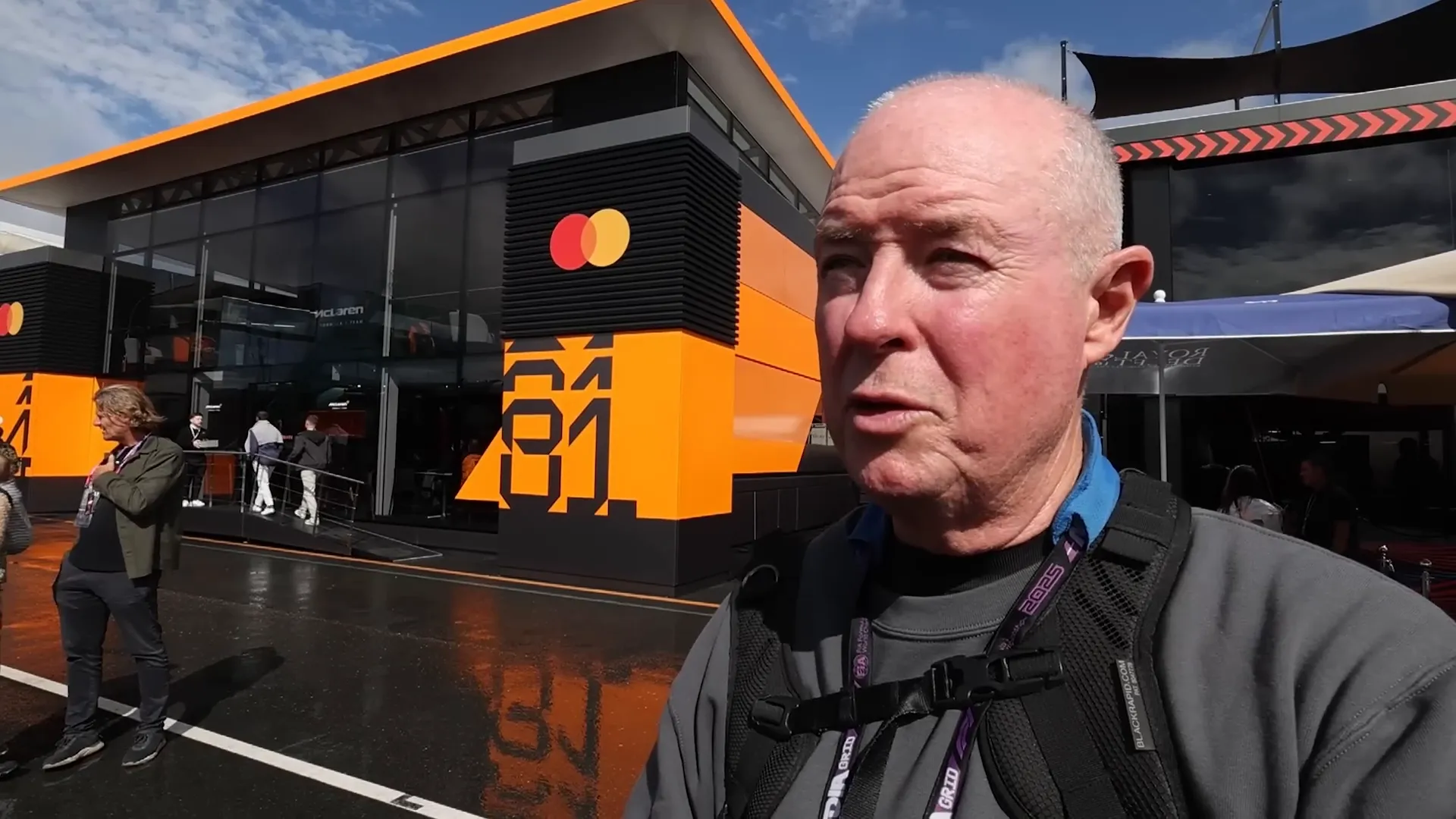 McLaren garage signage mock-up showing 'McLaren Mastercard' name placement