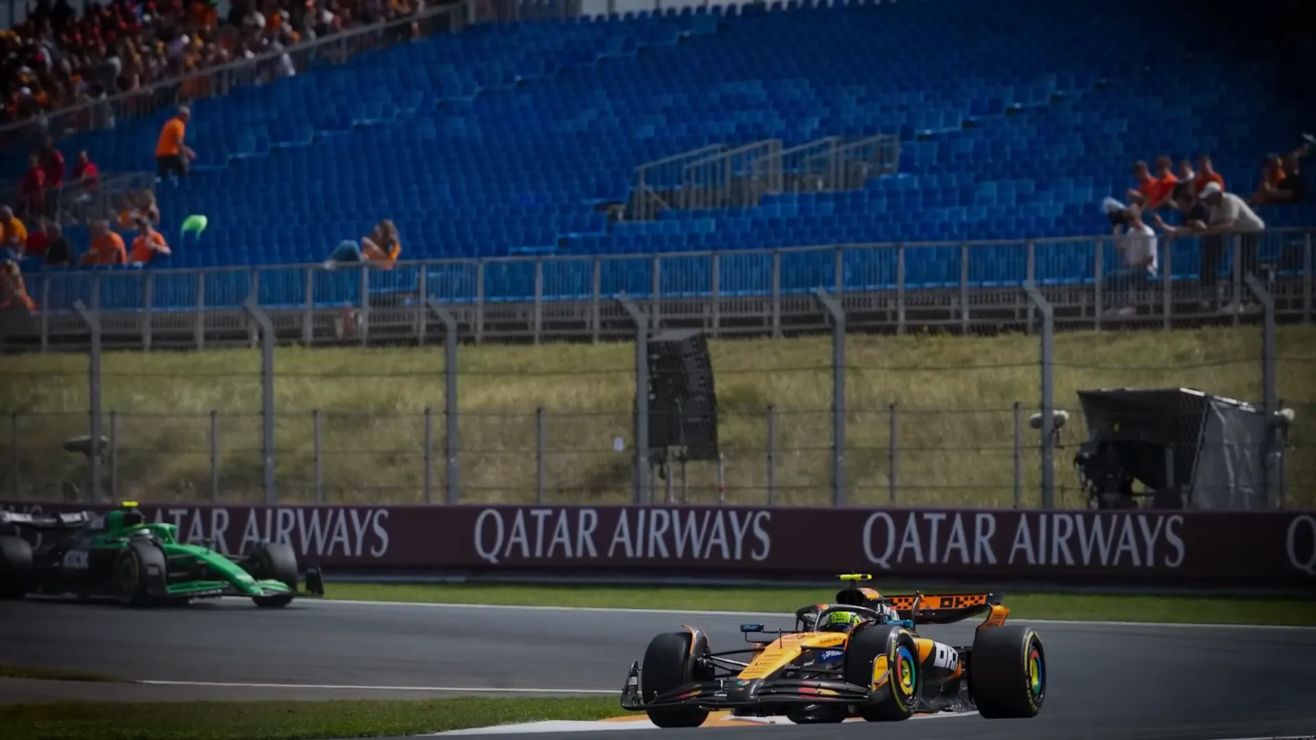 Charles Leclerc watching the race from the fence after the crash