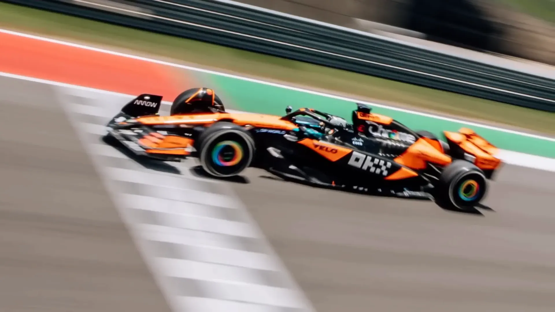 Brad Pitt driving Lando Norris' F1 car during the Austrian GP weekend