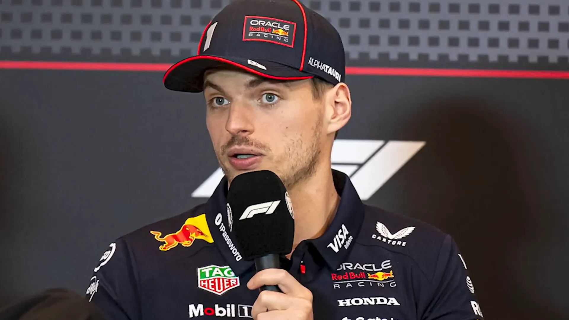 Max Verstappen responding sharply during the press conference