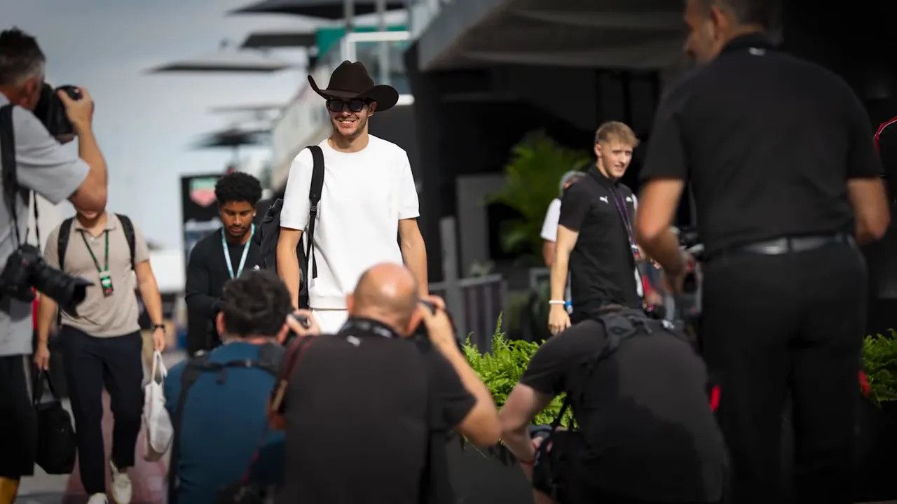 Esteban sporting a cowboy hat in the paddock