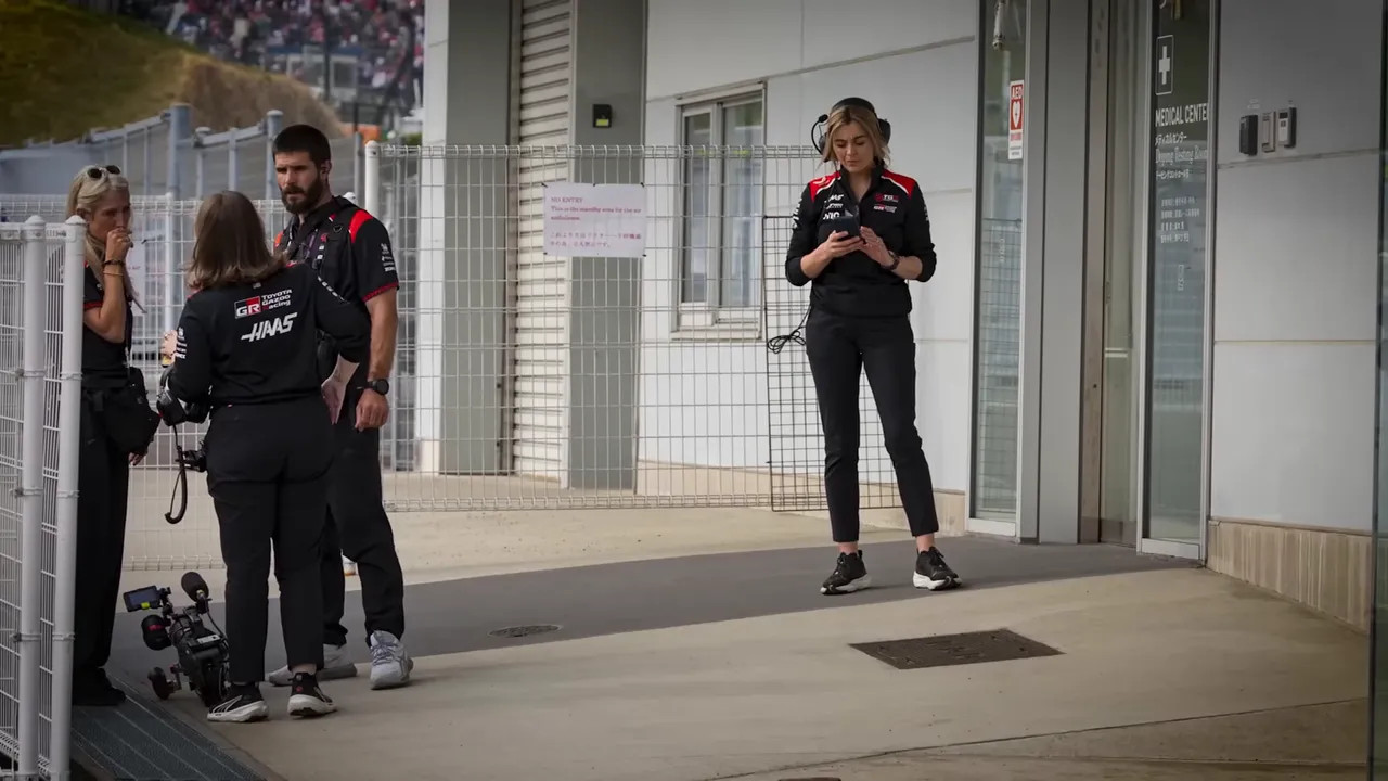Haas team members in the pit lane near the medical center during the Japanese Grand Prix