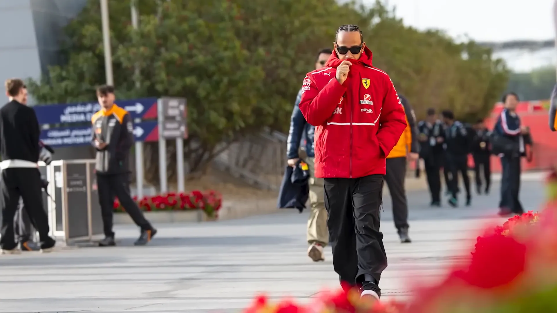 Lewis Hamilton arrives at the paddock